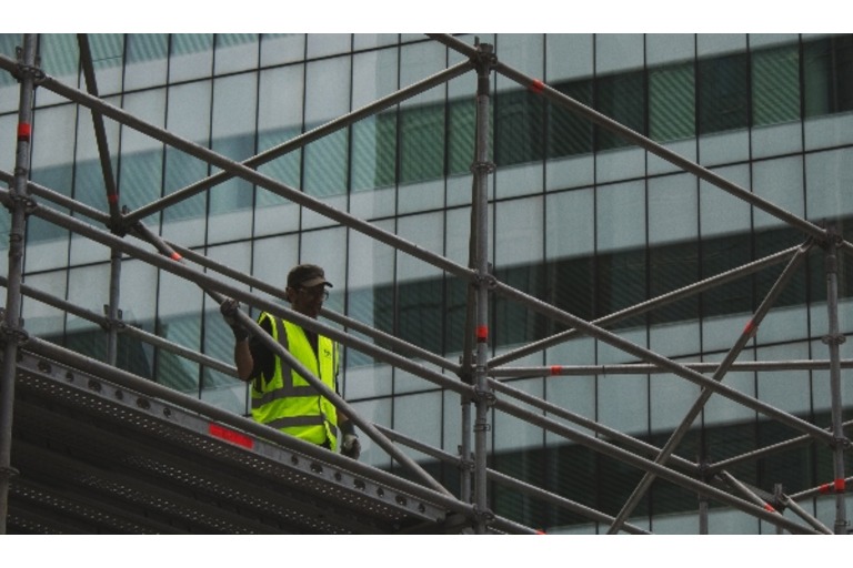 Man on mobile scaffold