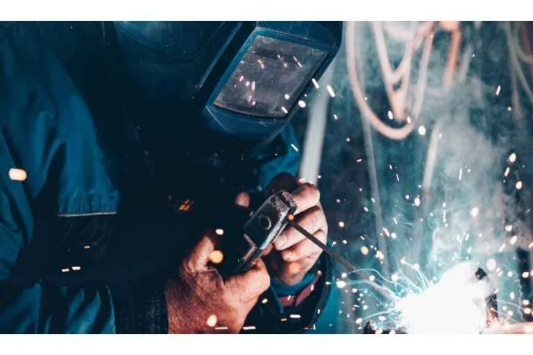 Man stick welding