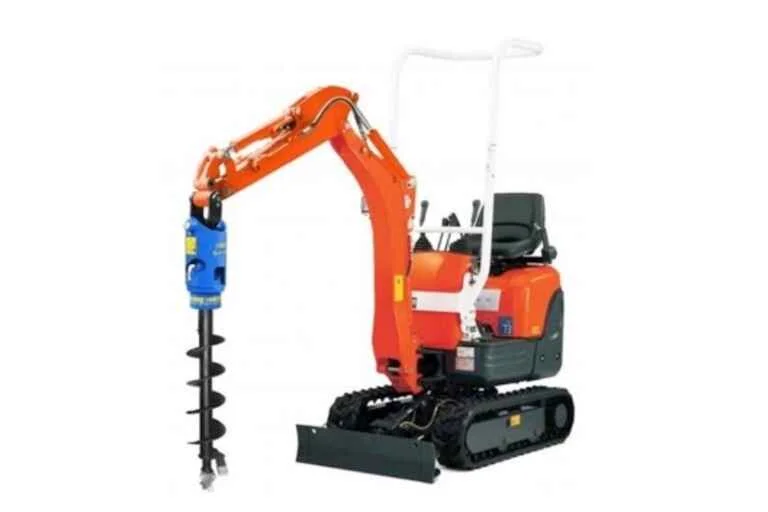 Auger attached to mini digger