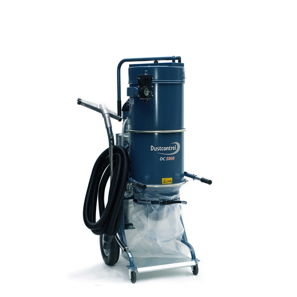 A blue dust extractor with a black pipe and clear bag with wheels for moving.