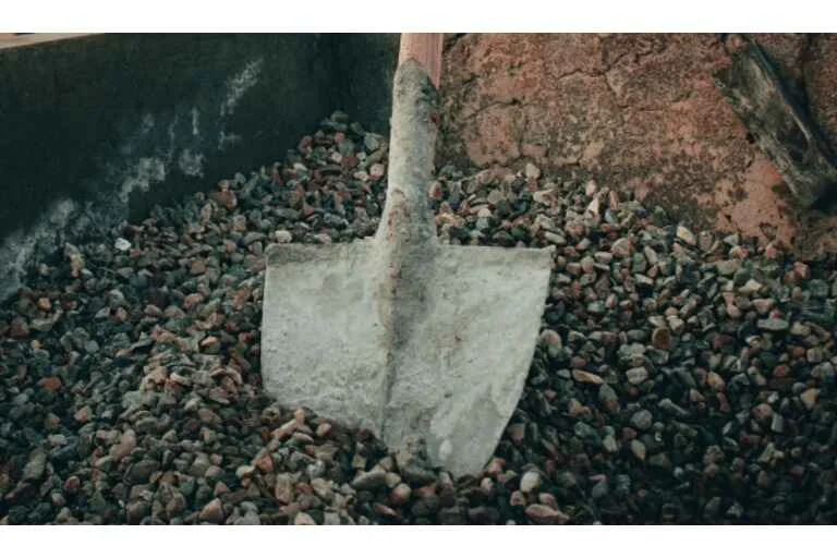 Spade in rubble