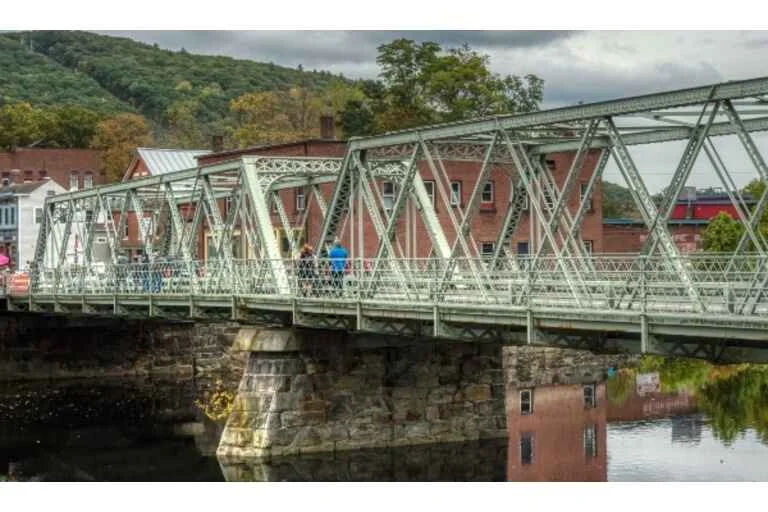 Grey metal truss bridge