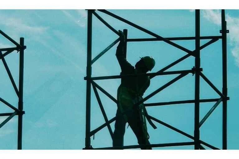 Worker on scaffolding