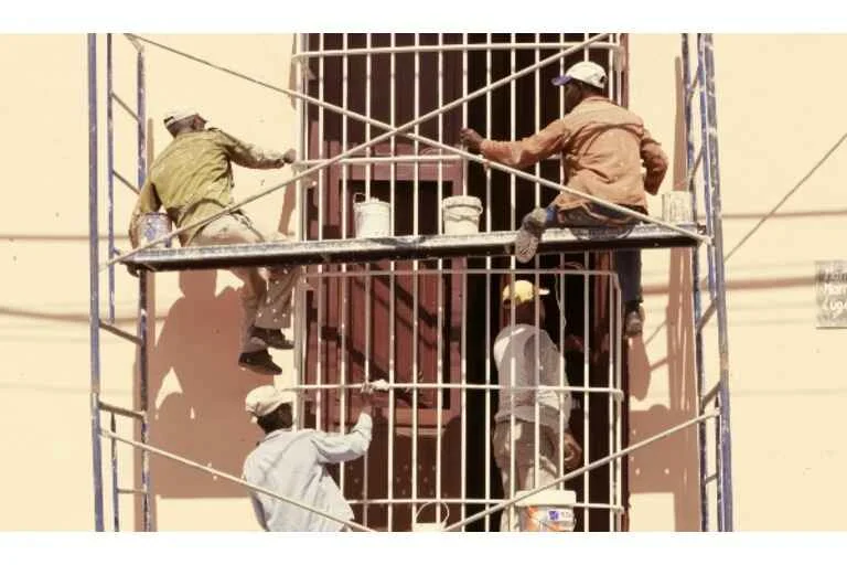 Workers on scaffolding
