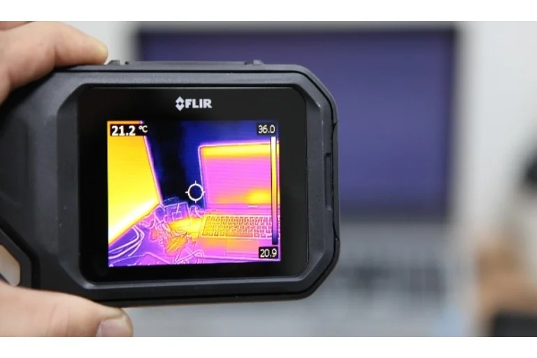 Person holding thermal camera