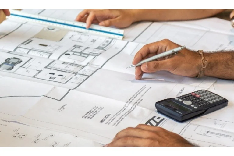 People writing construction plan