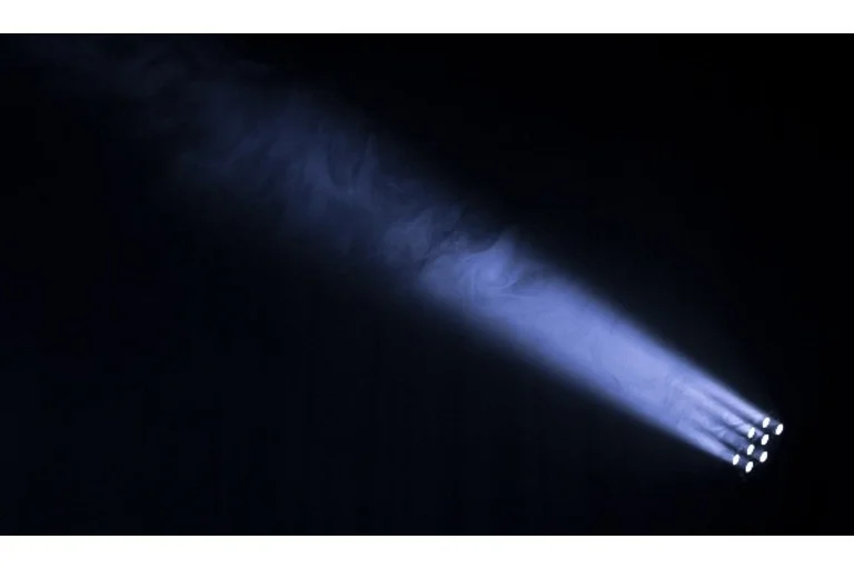 Light beams through black room