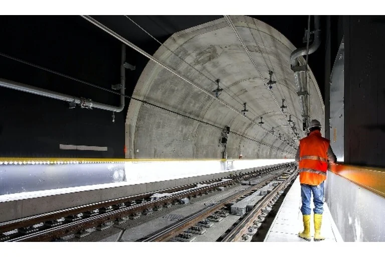 Man working in dark tunnel
