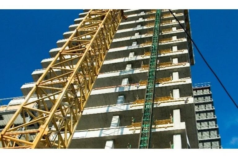 Scaffold against a building