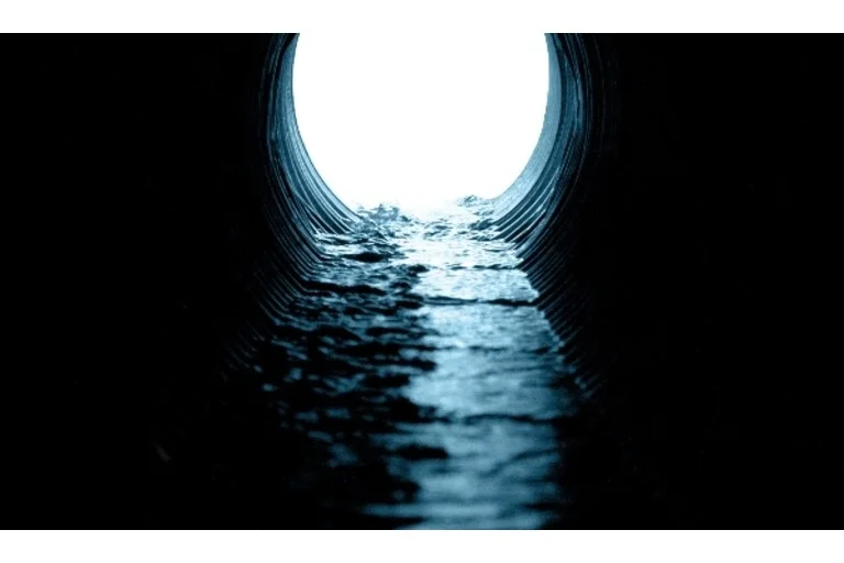 Water flowing through sewer