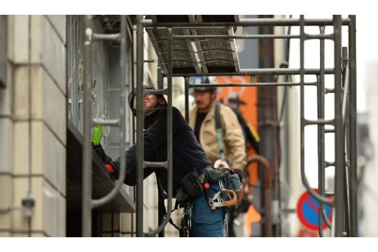 Man working on scaffolding