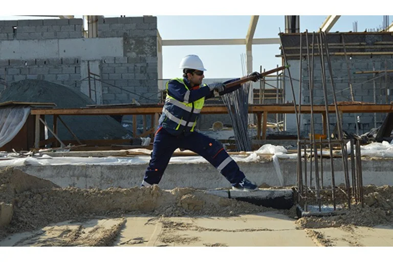 Man working in constructing on an exoskeleton